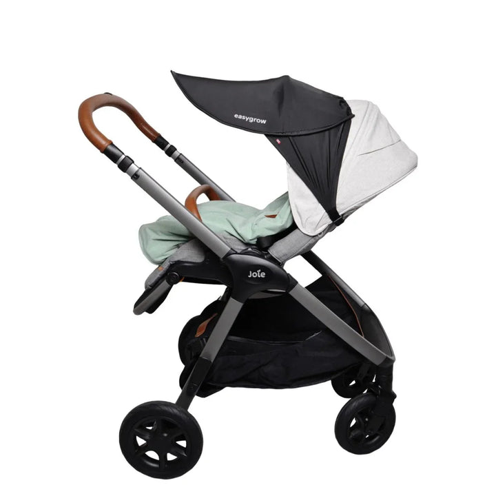Joie barnevogn med easygrow solskygg og grønn dekken, perfekt for babyutstyr 0-8 år