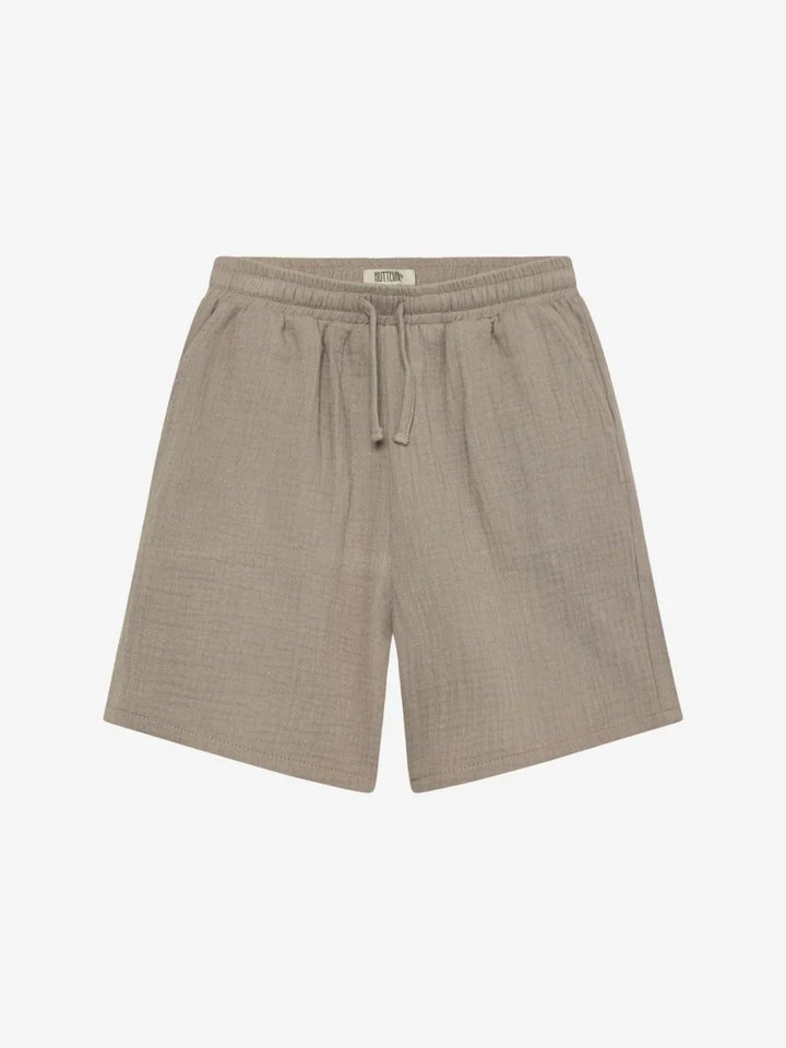 Beige barneshorts med elastisk liv og trekord, myk tekstil for komfort