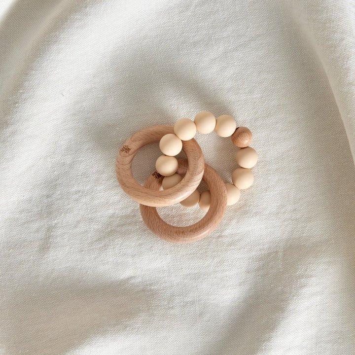 Trebebis leke med perler, myk og bærekraftig babyutstyr for spedbarn