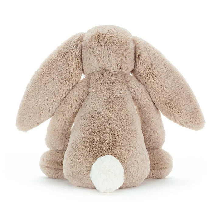 Myk beige kaninpynt med hvit hale, perfekt som barneleketøy eller babygave