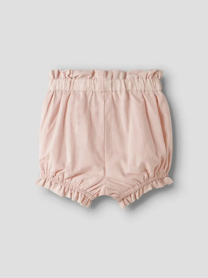 Myke rosa babybukser med elastisk liv og kant, ideelle for spedbarn og småbarn 0-8 år