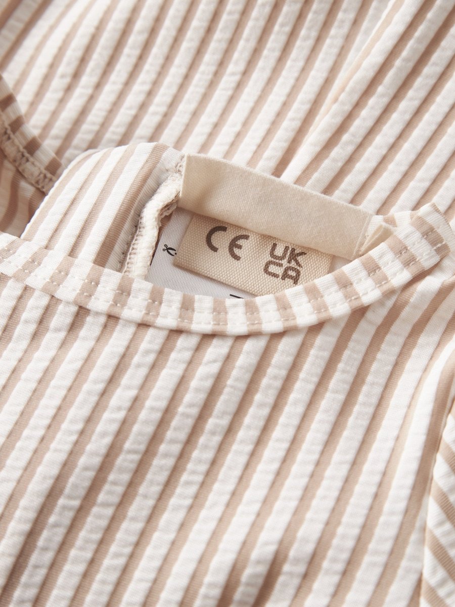 Lil' Atelier Baby FONDO LS UV SUIT - Oxford Tan | Torgunns Barneklær AS