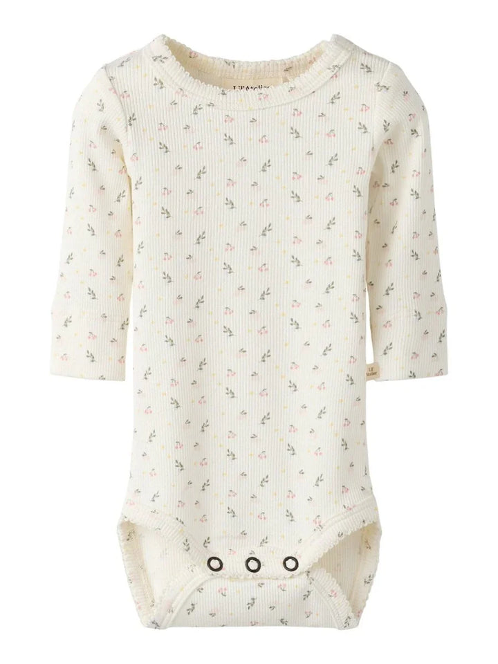 Myk babybody med blomstermønster og lange ermer, perfekt for spedbarn 0-8 år