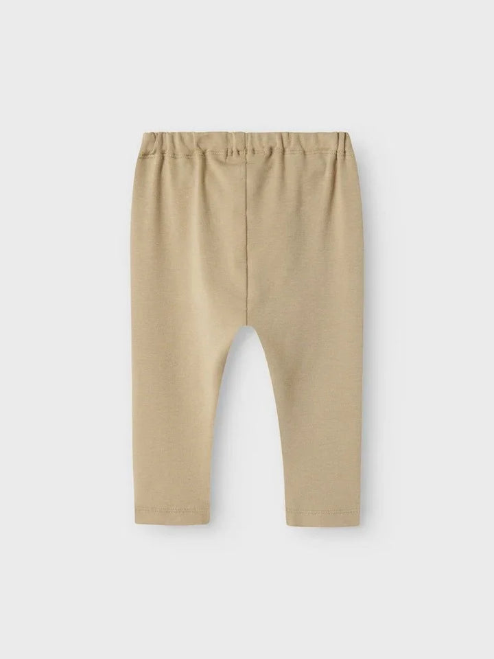 Beige babybukser med elastisk liv, myke og bekvemme barneklær for spedbarn og småbarn