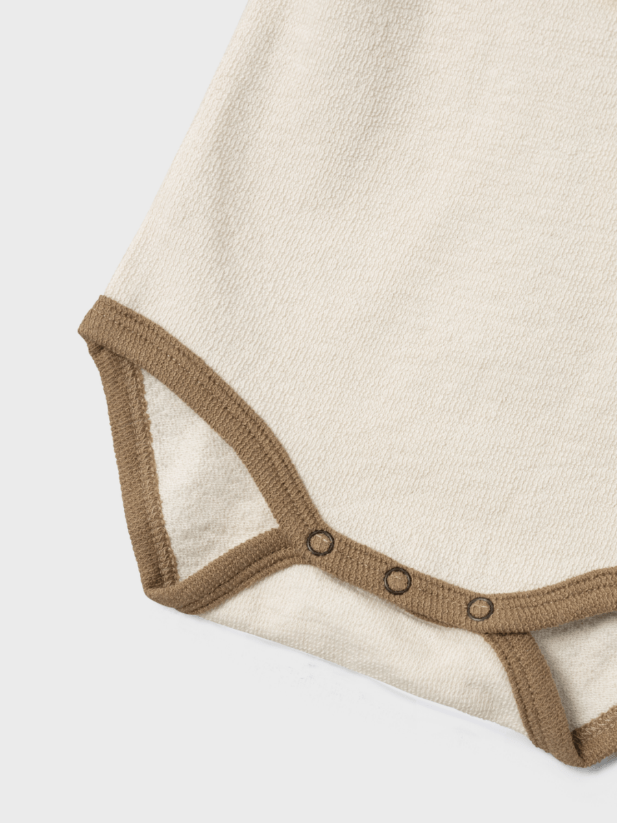 Lil' Atelier Baby NUNAN LS NREG BODY - Birch | Torgunns Barneklær AS