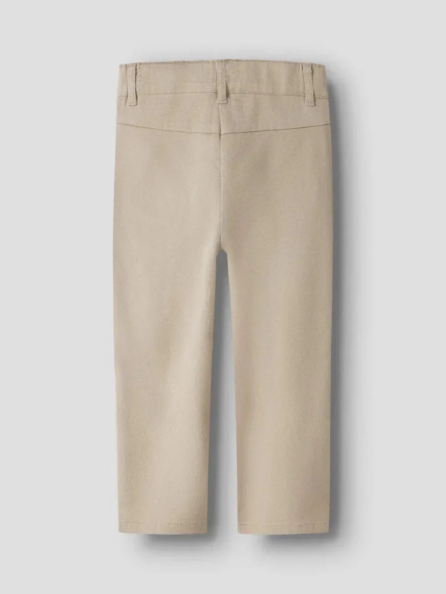 Beige barnetrousers med elastisk liv, myke og komfortable for små barn