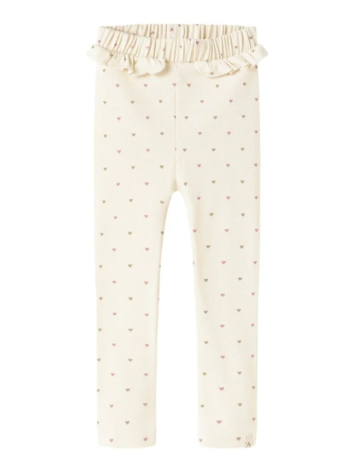 Myke babybukser med hjerteprint og ruffel i livet, perfekt for spedbarn og småbarn