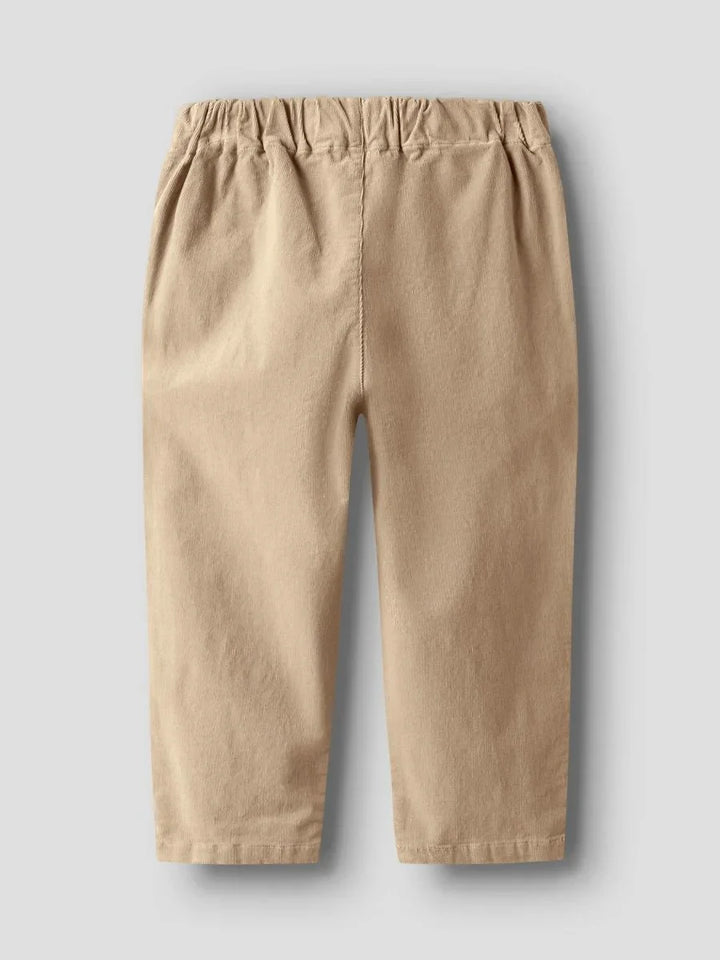 Beige barnetrousers med elastisk liv, myke og komfortable for små barn