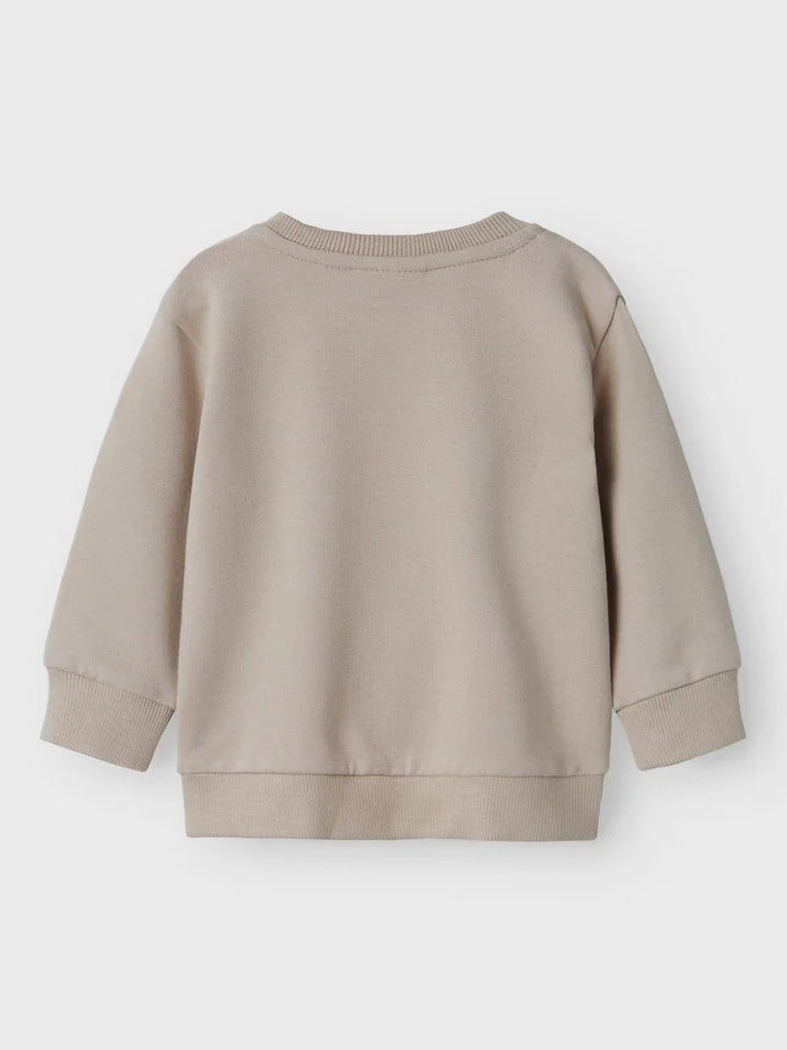 Myk beige genser for spedbarn og småbarn, med runde ermer og nederkant
