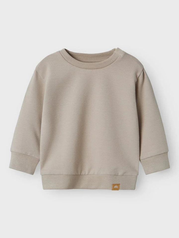 Myk beige genser for spedbarn og småbarn, bærekraftig barneklær med ribbet kant