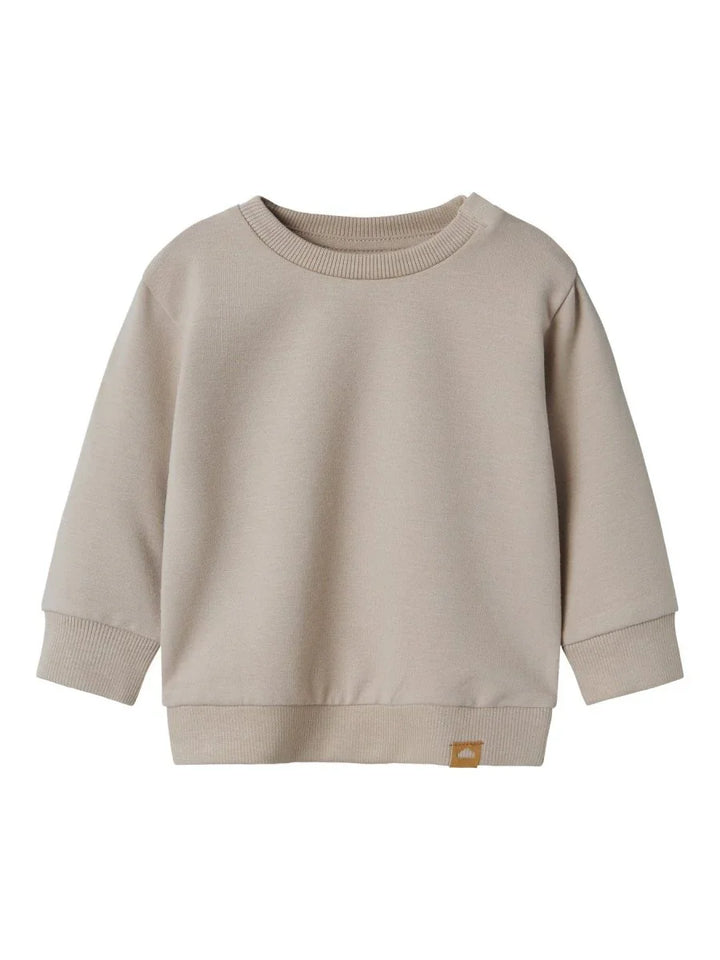 Myk beige genser for spedbarn og småbarn, med runde ermer og bærekraftig design