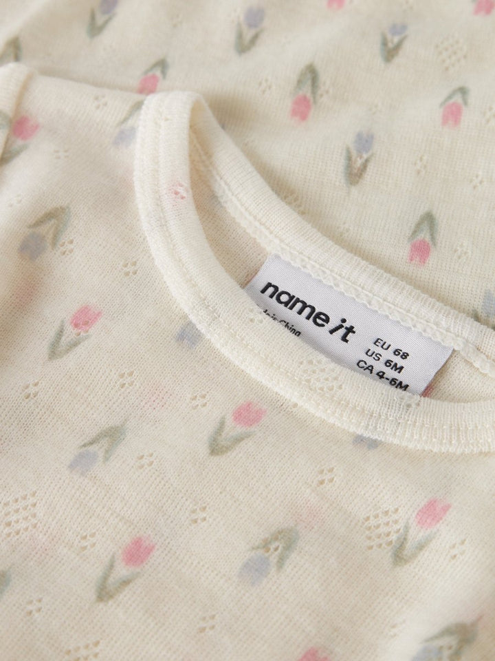 name it baby WANG ull body i merinoull – Coconut Milk | Blomster | Torgunns Barneklær AS