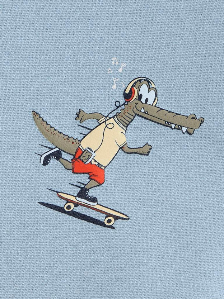 Gullig krokodille på skateboard med hodetelefoner, barneklær med sjovt trykk
