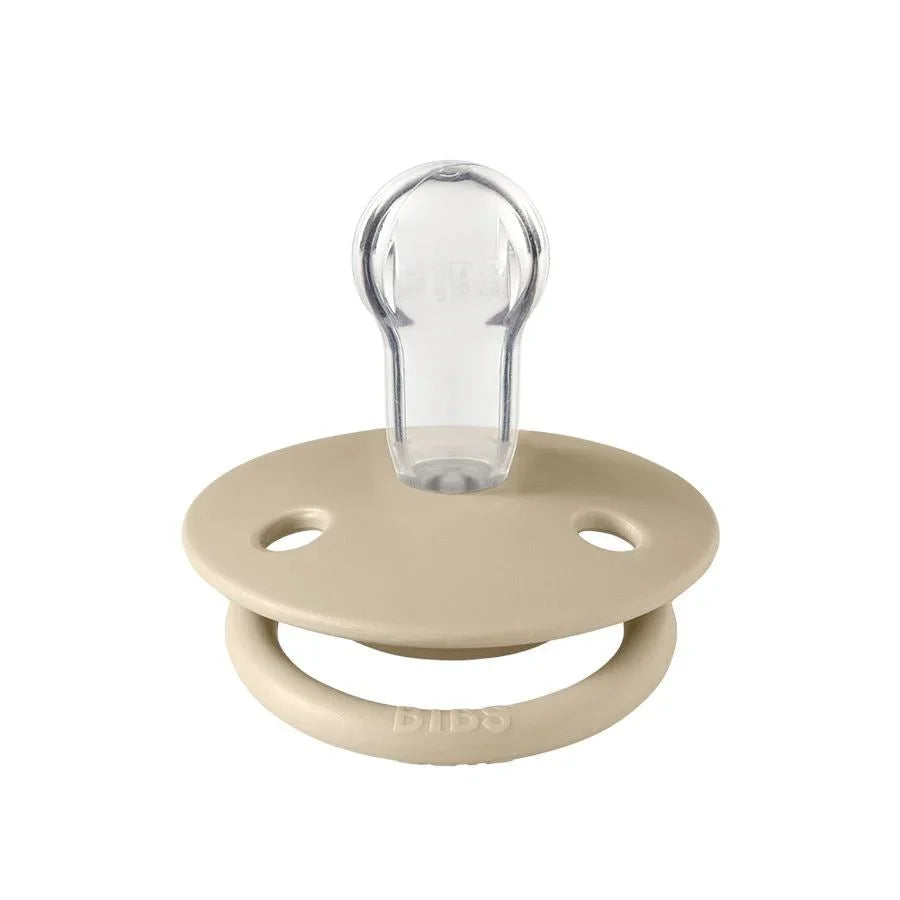 Beige DIBS babysove med gjennomsiktig nippel, myk og trygg for spedbarn