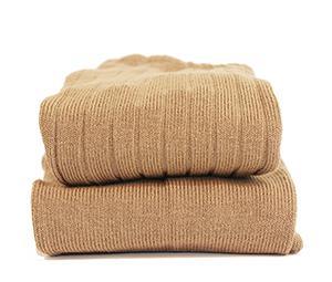 Myke ullbukser for barn, strøkne i beige, perfekt for varme og komfort